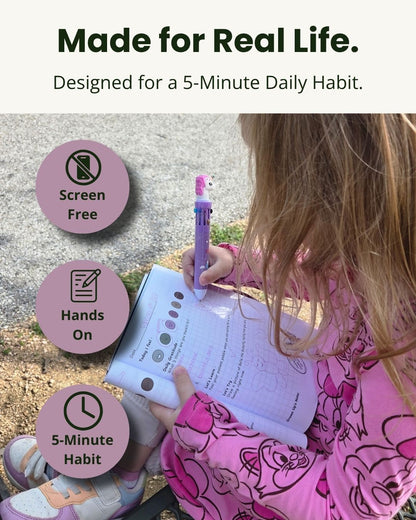 Child using the Internal Compass kids journal as a screen-free five-minute daily emotional wellness activity for ages 5–11.